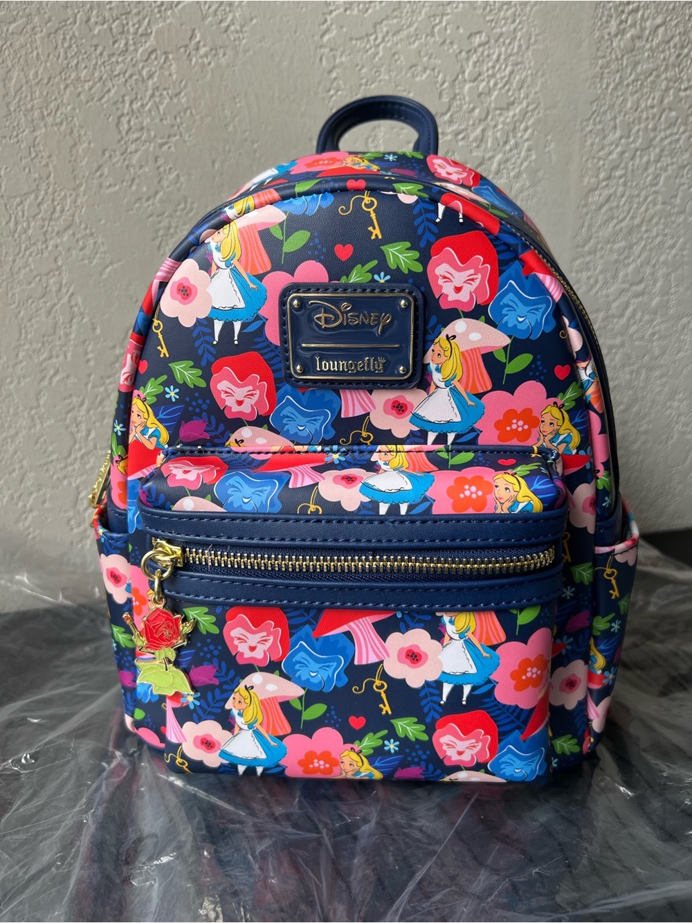 Loungefly Disney LASR Alice in Wonderland Golden Afternoon Floral Mini Backpack